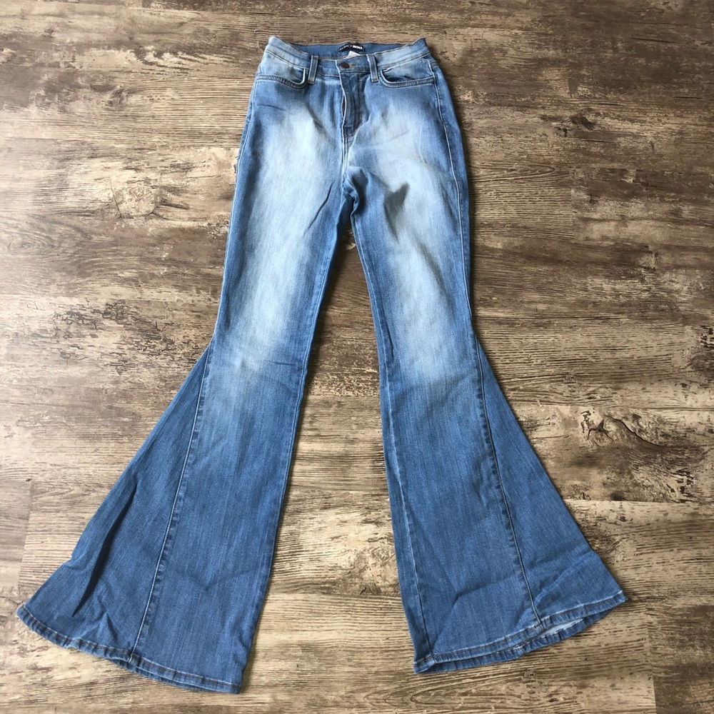 Fashion Nova light wash stretch flare leg jeans.